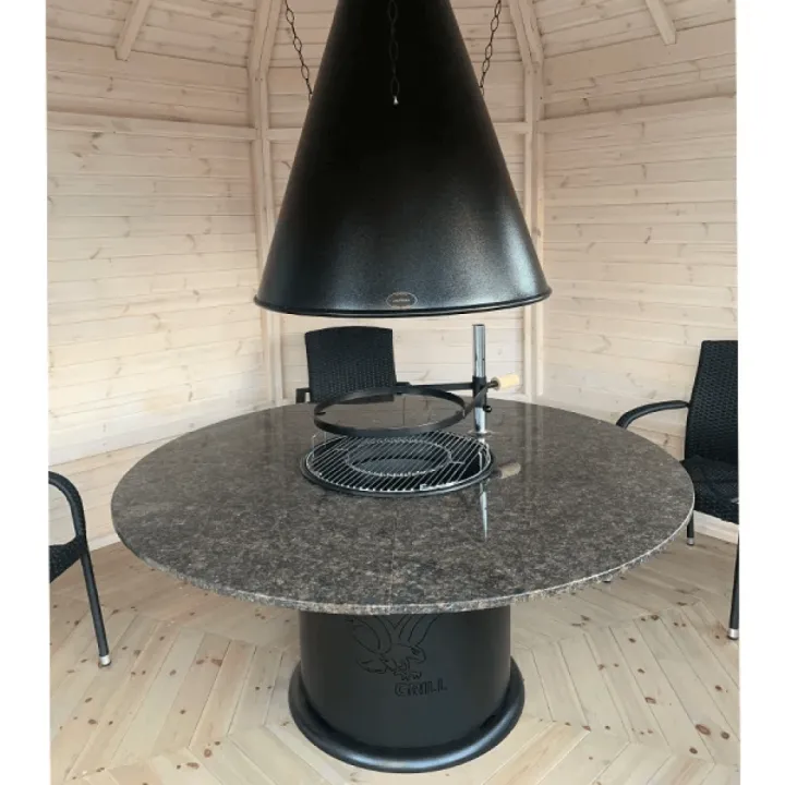 Apetit-Pöytägrilli JTG/2. Graniittitasolla ja huuvalla piharakennuksen sisällä