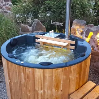 Palju 3: lle henkilölle yläpuolelta kuvattuna, sisällä kamiina